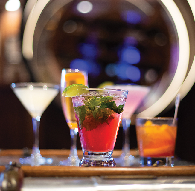 A lineup of colorful cocktails