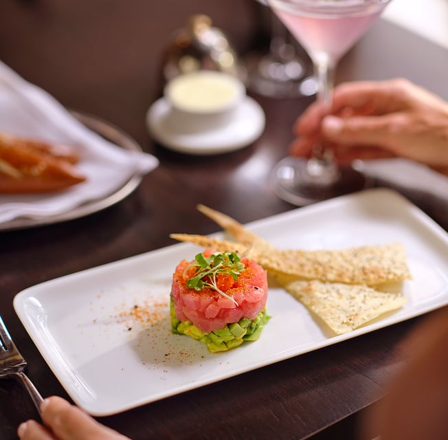 A tartare dish with crostini