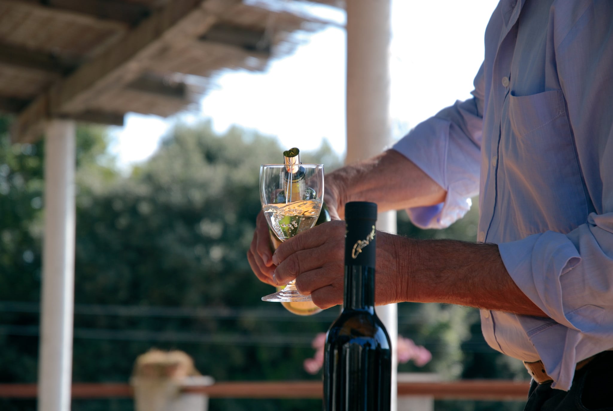 pouring glass of wine